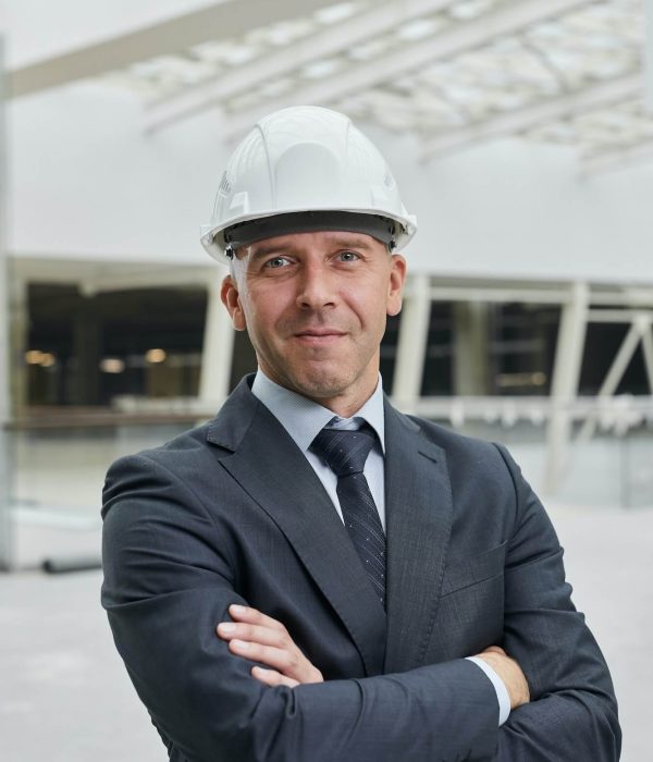 confident-businessman-at-construction-site-1.jpg