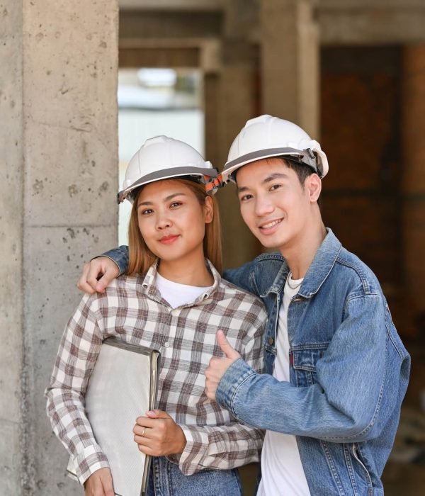 two-happy-investors-in-helmet-standing-at-construction-site-real-estate-investors-concept-1-1.jpg